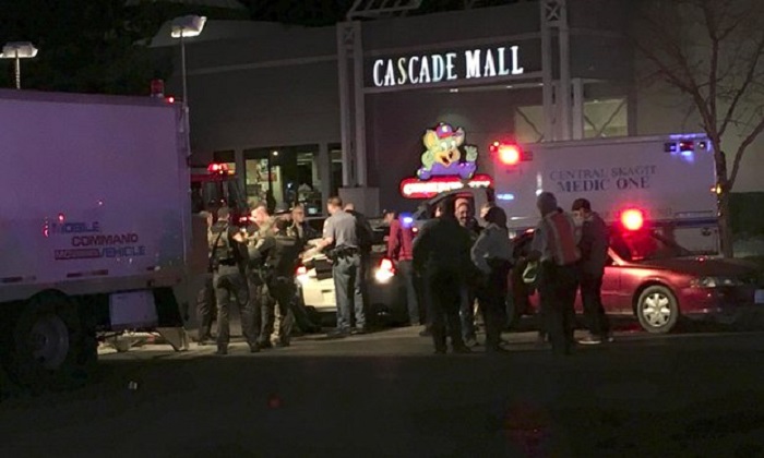 Washington shooting: police hunt gunman after three people killed in mall attack 
